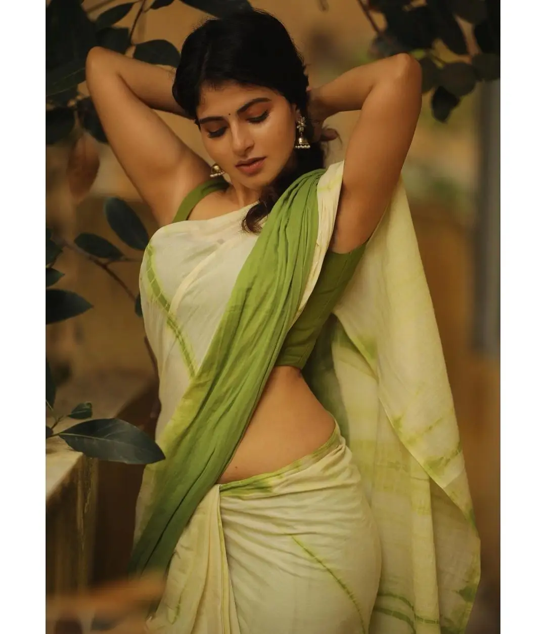 Indian Actress Iswarya Menon In Traditional Green Saree Sleeveless Blouse